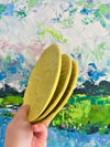 Trio of yellow Cabbageware saucers