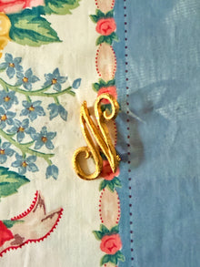  N Brooch